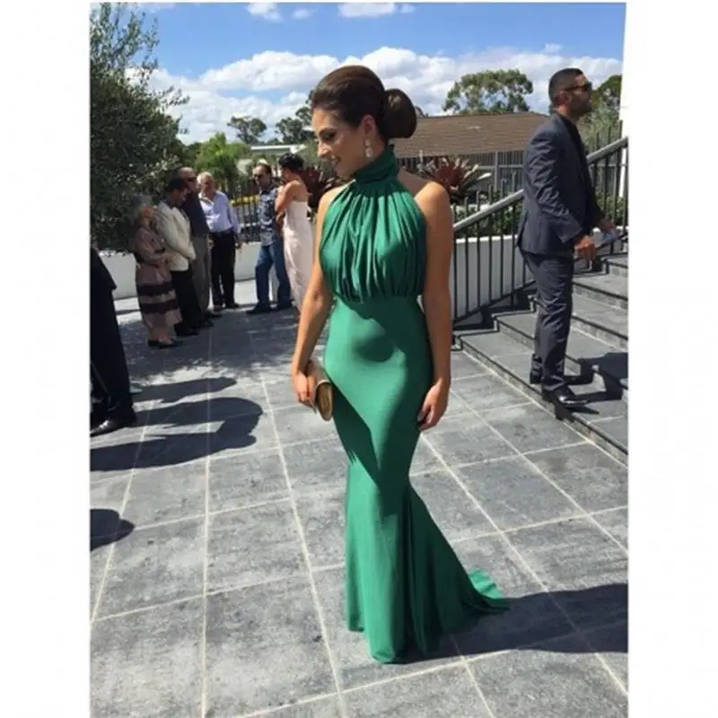 emerald green wedding guest outfit