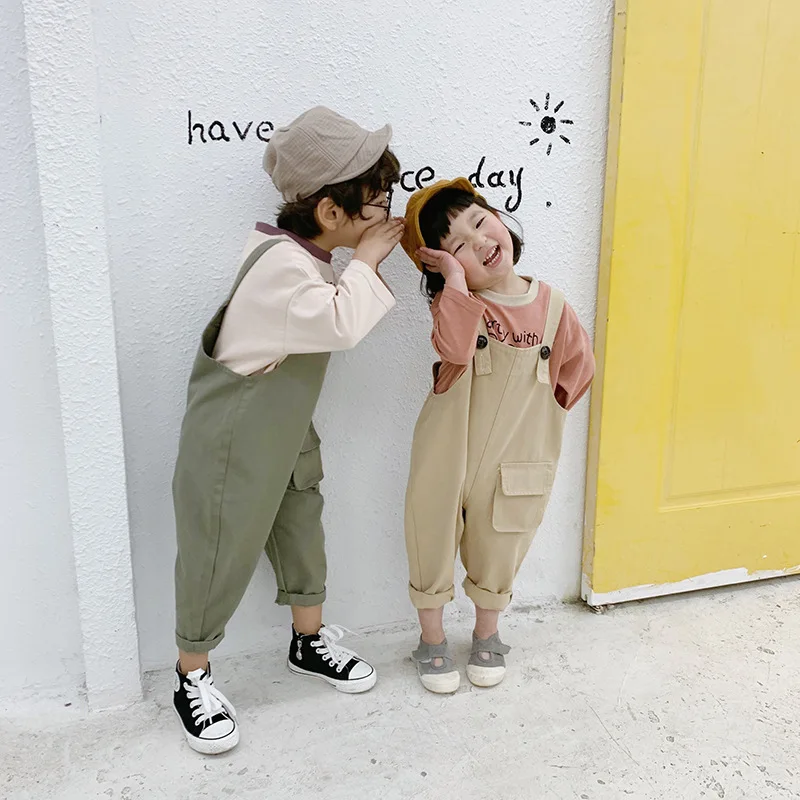 Coreano das Crianças para Meninas de Moda Meninos da Criança Jumpsuit Ocasional Macacão Bolso Grande Calças 2 3 4 5 6 7 Anos Crianças Macacões Novo 28 High Quality Mamãe e Bebê