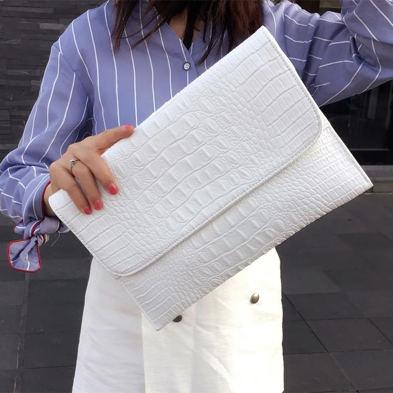 white croc clutch bag