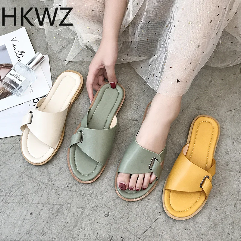 

2019 new patent leather flat bottom slippers female summer buckle breathable open toe fashion wear wild lazy beach sandalsH0097