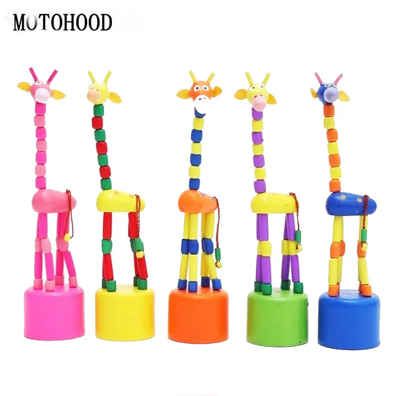 Пляшущая игрушка. Деревянный Жираф дергунчик. Игрушка Жирафик. Детская игрушка деревянная Жирафик. Танцующая игрушка.