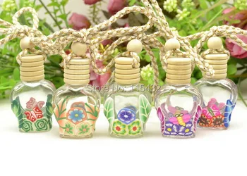 

Factory Price 100pcs 8ml Refillable Car Glass essence oil Perfume bottle Hang rope Pendant hang empty bottle + Free Pipette PB55