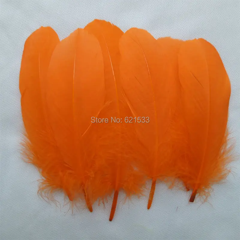 

Loose ORANGE Goose Satinettes feathers(200 Feathers per lot) Perfect for crafts,costume design,headbands or hair fascinators