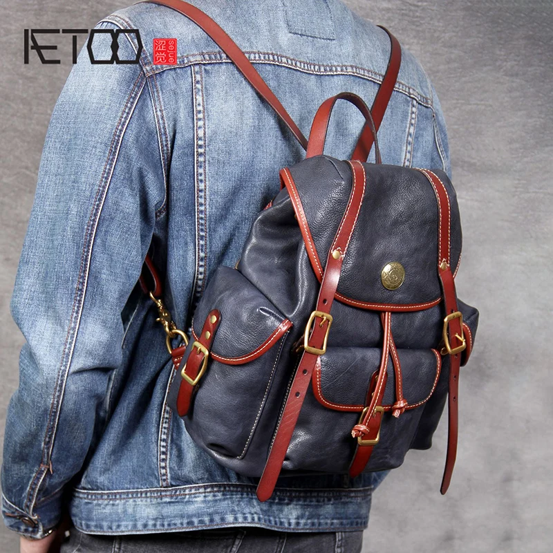 

BJYL Personality head Cowhide Double shoulder bag retro handmade leather male and female backpack
