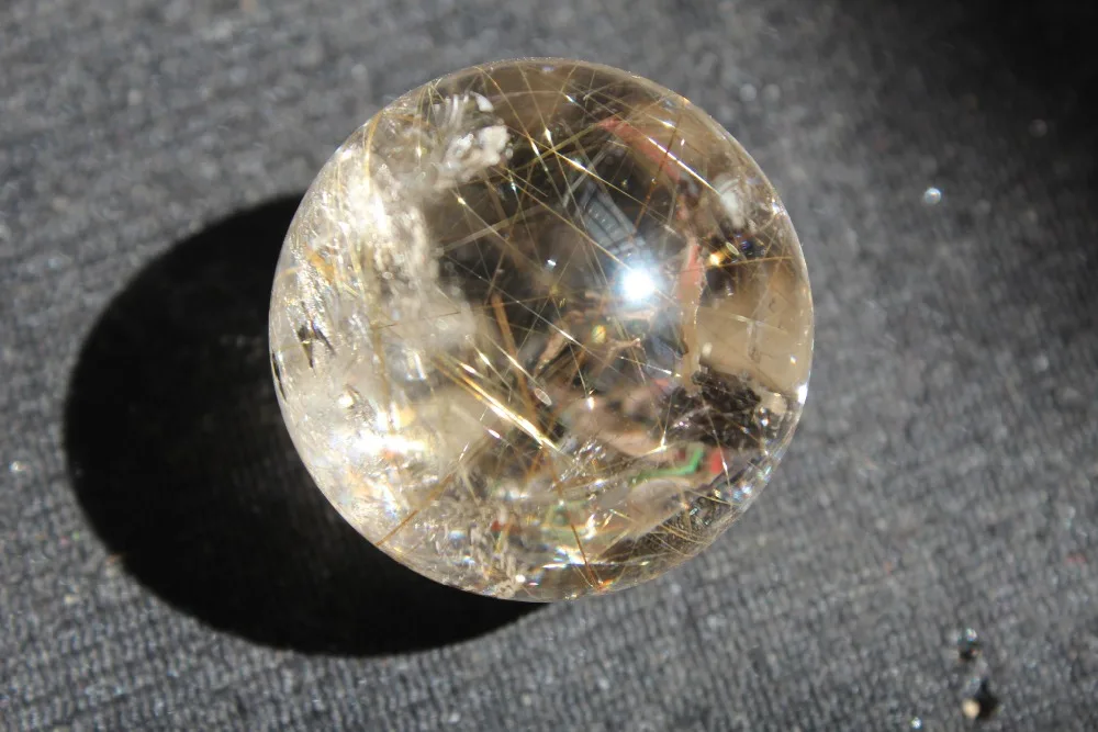 

Natural rutilated quartz crystal ball