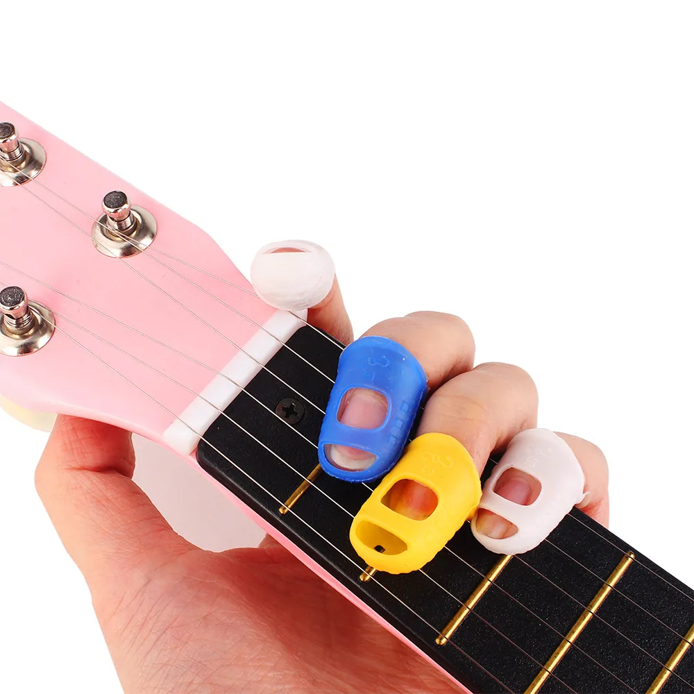 SOACH 4pcs/Lot Guitar finger Guitarra fingerstall,dedo cuerda de guitarra , material de silicona Guitar picks Accessories