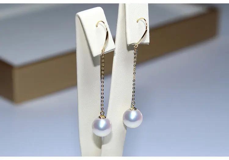 

gorgeous pair of 10-11 south sea round white pearl dangle earring 18k