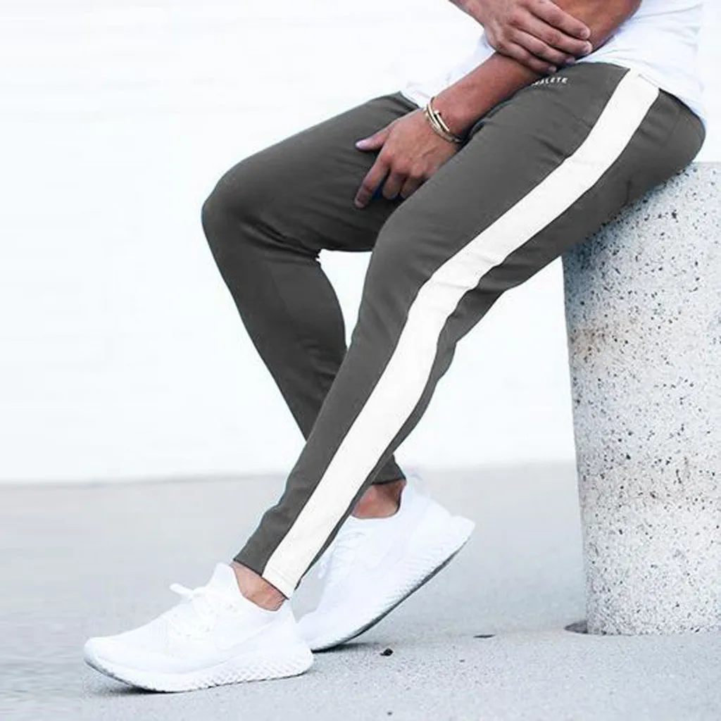 FeiTong السراويل الرجال نحيل Sweatpants 2019 جديد الترفيه ضيق السراويل أزياء مريحة السراويل الرياضية الشارع الشهير المسار عداء ببطء