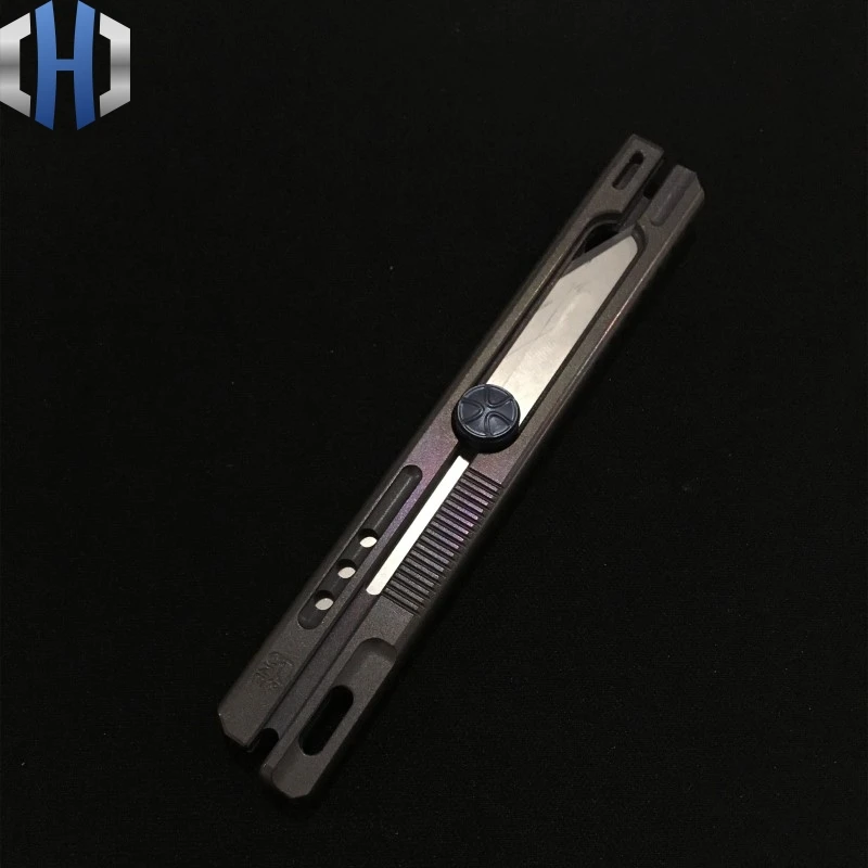 Three Generations Of Titanium Alloy Section Of Utility Knife Heavy Cutting Paper EDC Single Hand Opening And Closing Of The Box Three Generations Of Titanium Alloy Section Of Utility Knife Heavy Cutting Paper EDC Single Hand Opening And Closing Of The Box