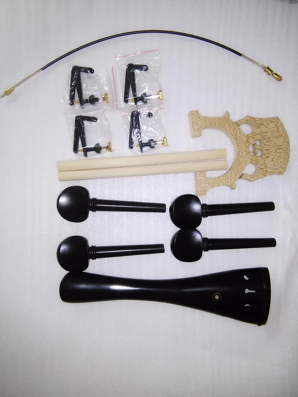 

One Set Ebony Cello Parts 4/4+4 Tunerand Gut and 2 sound post and Bridge and 1 set String all 4/4