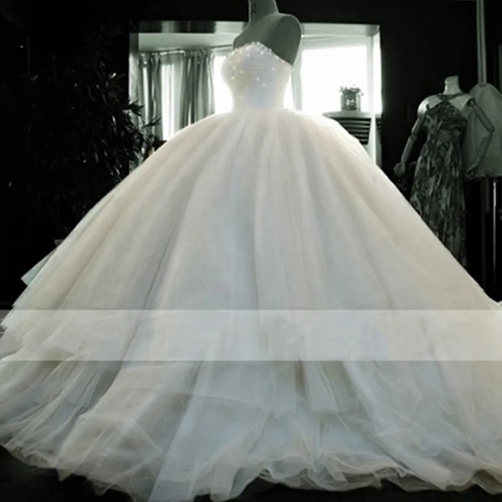 

Ball Gown Wedding Dresses Plus Size Tulle Strapless Vestidos de Noiva Beaded Wedding Gowns Simple Gothic Bride Dresses Puffy