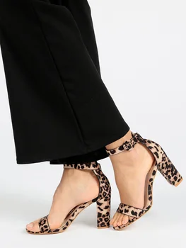 

High-heeled sandals and fancy leopard strap