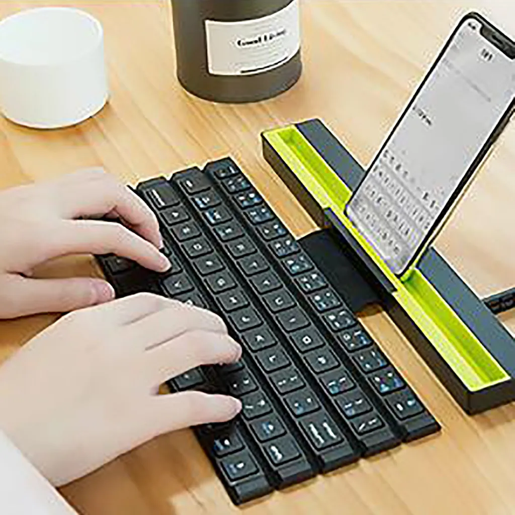 R4 64 Keys Reel Portable Mini Folding Bluetooth Keyboard Foldable Wireless Keypad for Tablet