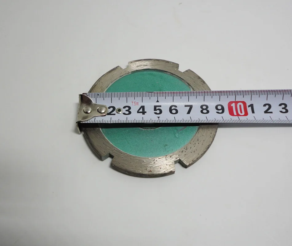 

Arc within thick diamond saw blade piece slotted piece of stone pots