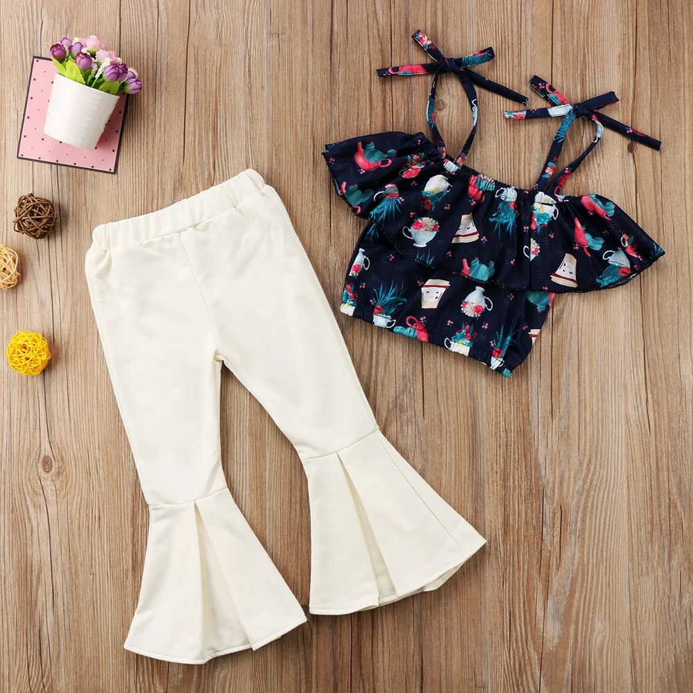 

Fashion Toddler Kids Girls Clothes Bowknot Strap Off Shoulder Short Sleeve Floral Tops White Flares Pants 2pcs Set Clothing 1-6T