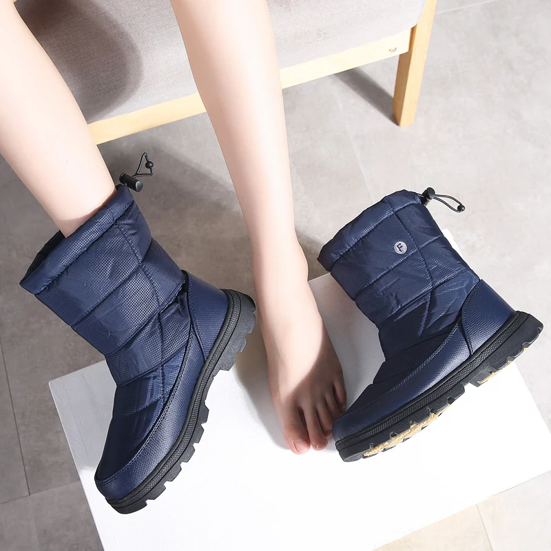 

TKN Women Winter Snow Boots Krasovki High Boots Warm Fur Plush Rubber Shoes Woman Sneakers Mid-Calf Waterproof Rain Boots 1811
