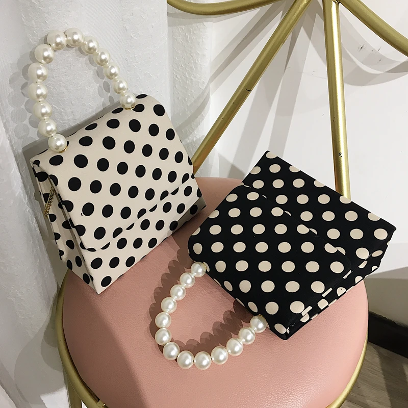 white pearl handle bag