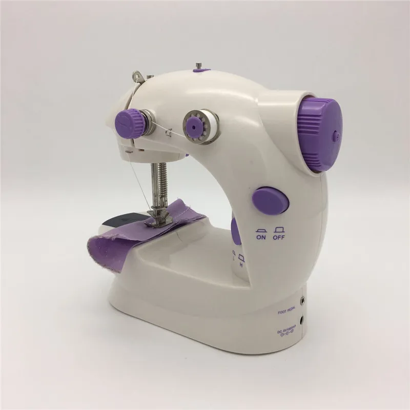 Portable ewing machines Mini Handheld sewing machines Sew needlework Cordless Clothes Fabrics Manual Household Sewing Machine