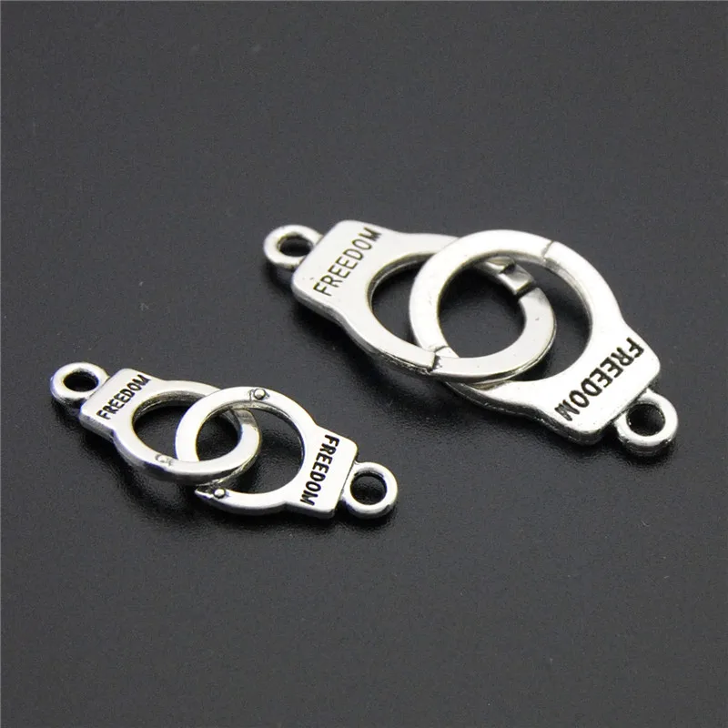 

10pcs Antique Sliver Metal Freedom Handcuffs Charm Metal Charms For Jewelry Making