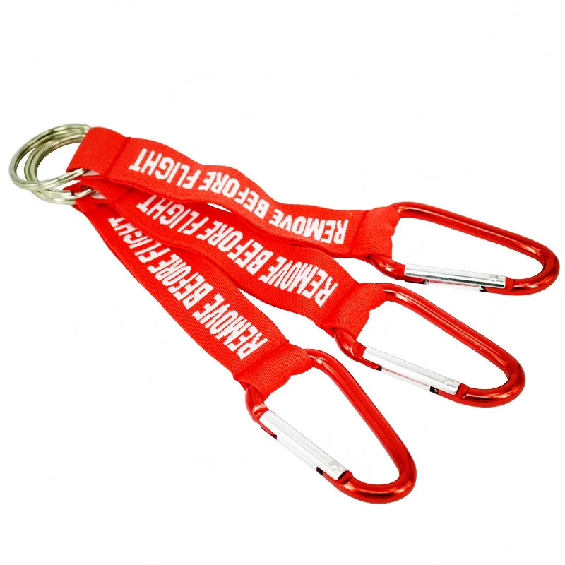 

Classic Slogan Key Chains Red Keychain Woven Letter Keyring Jewelry Pilot Tags OEM Outdoor Sport Key Ring Safety Tag