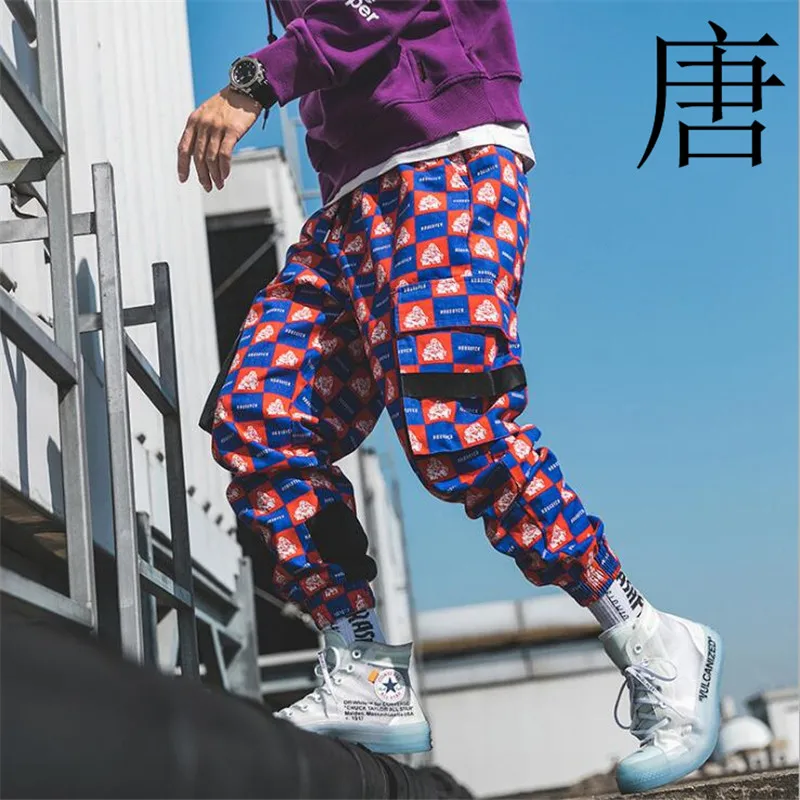 Тан Прохладный для мужчин полный печати джоггеры брюки для девочек 2019 s уличная Спортивные штаны мужской хип хоп моды карман