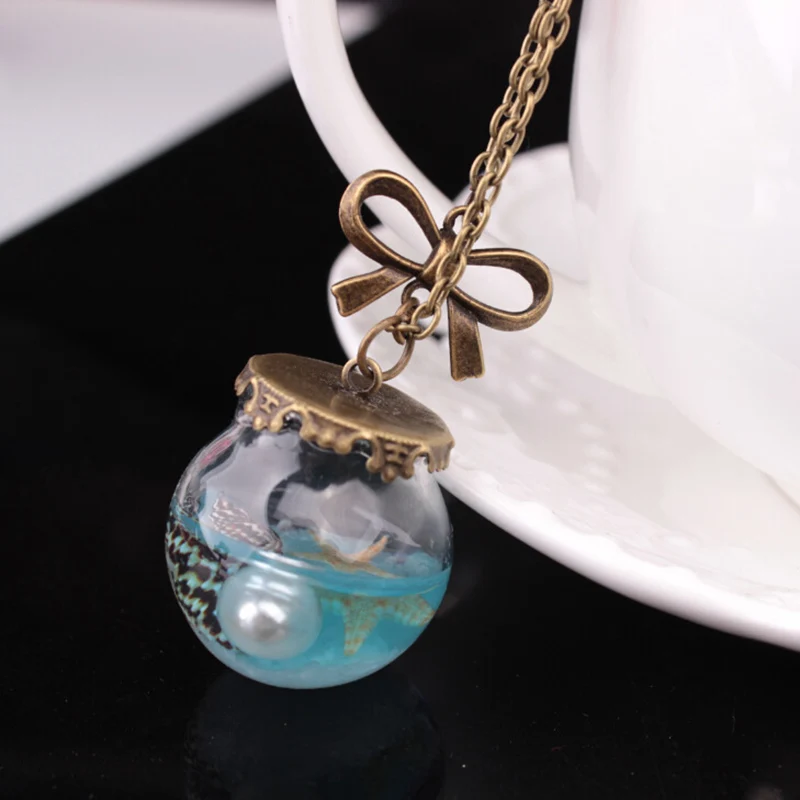 

Round Bottle Glass Ball Starfish Chain Necklace Women Sea Shell Pearl Bowknot Pendent Necklace Ocean Theme Boho Choker Jewelry