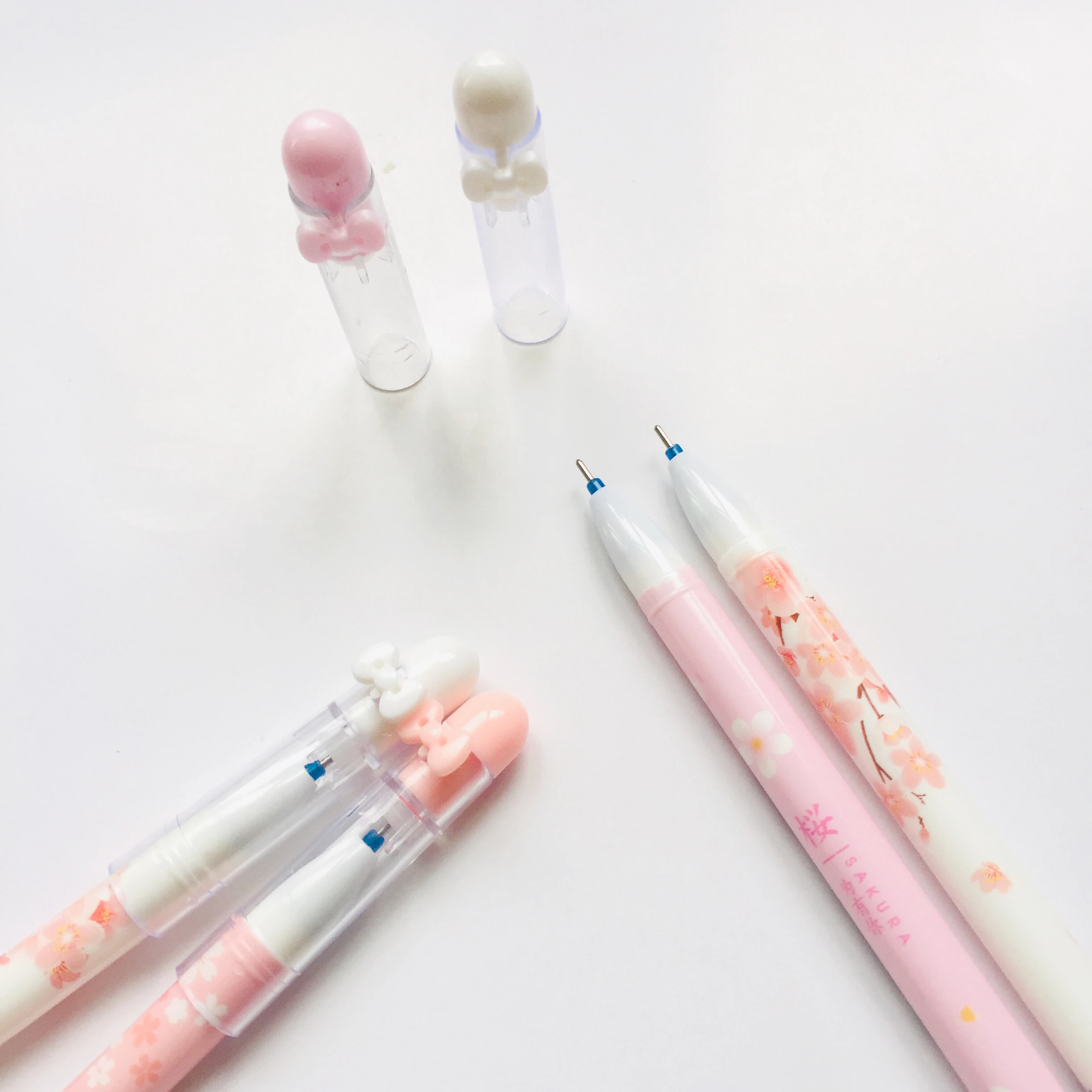 

2pcs/Set Romantic Bow Sakura Erasable Gel Pen Writing Pen Stationery Blue Ink