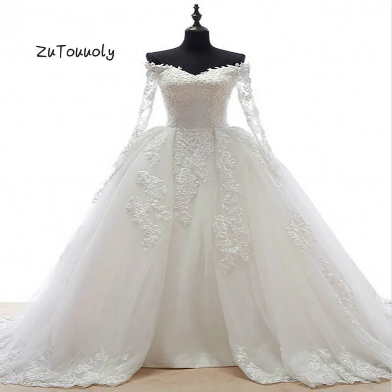 

Off The Shoulder Ball Gown Wedding Dresses Illusion Long Sleeves Puffy Tulle Appliques Church Button Back Wedding Gowns 2019