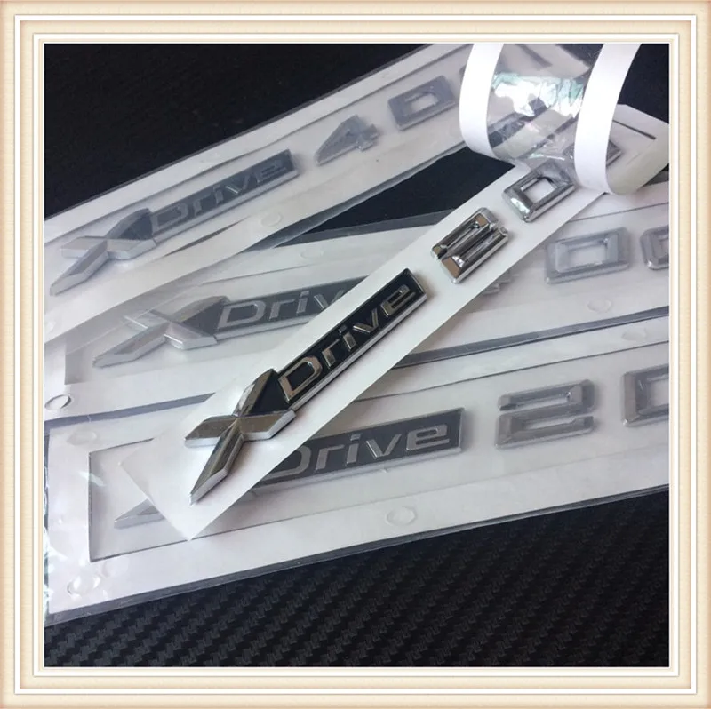 Новый, 2 предмета стайлинга автомобилей 3D ABS xDrive 20d 25d 28D 30d 35d 40D 45d 48d 50d Сторона Эмблемы Стикеры для x3 E83 F25 X4 F26 X5 E70 - изображение