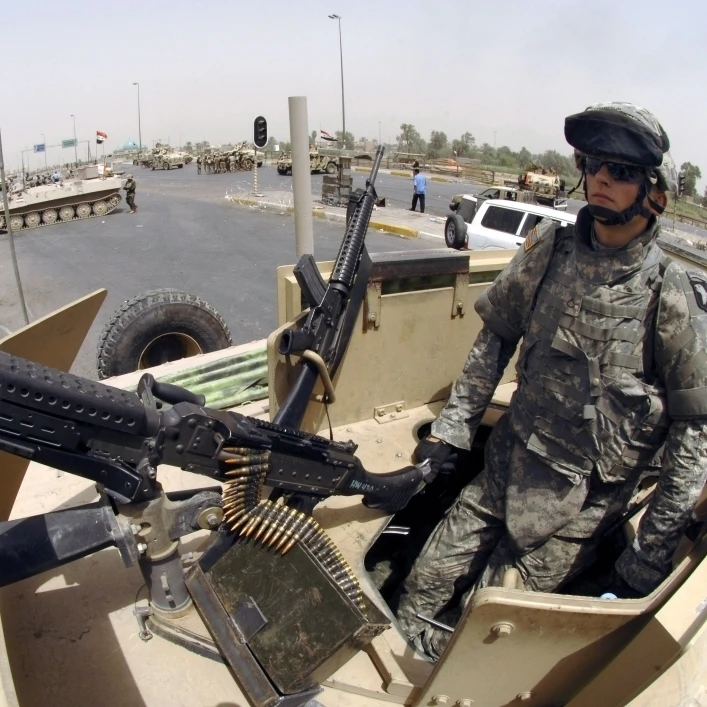 U.S. Army soldiers secure the streets for Iraqi citizens Poster Print (16 x 11)