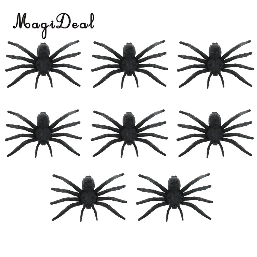 white plastic spiders