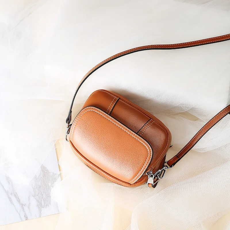 Fashion luxury oval Genuine Leather crossbody bags for women bag beautiful sewing thread decorated women messenger bags