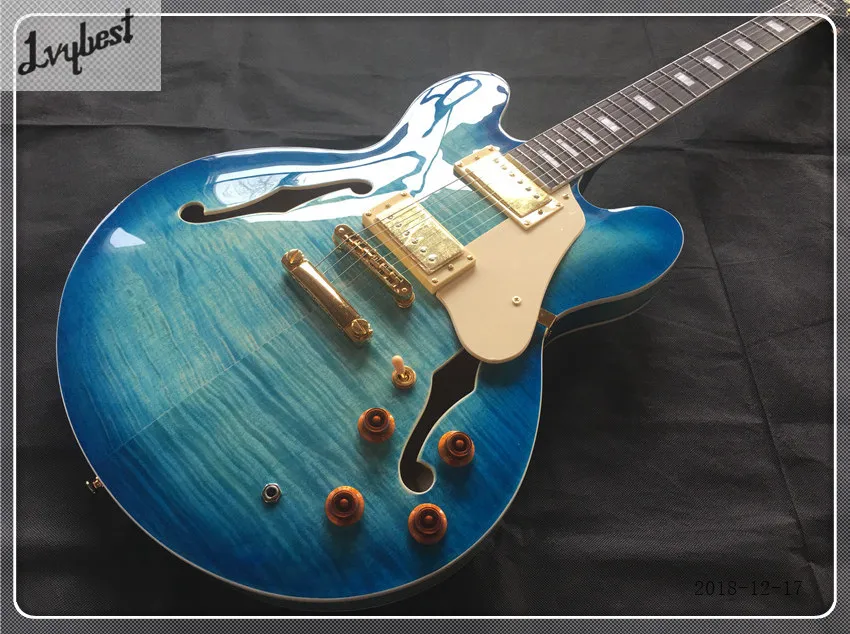 

lvybest customized jazz hollow body guitar,flame top and back,blue burst finished,gold parts,cream pickguard,free shipping!