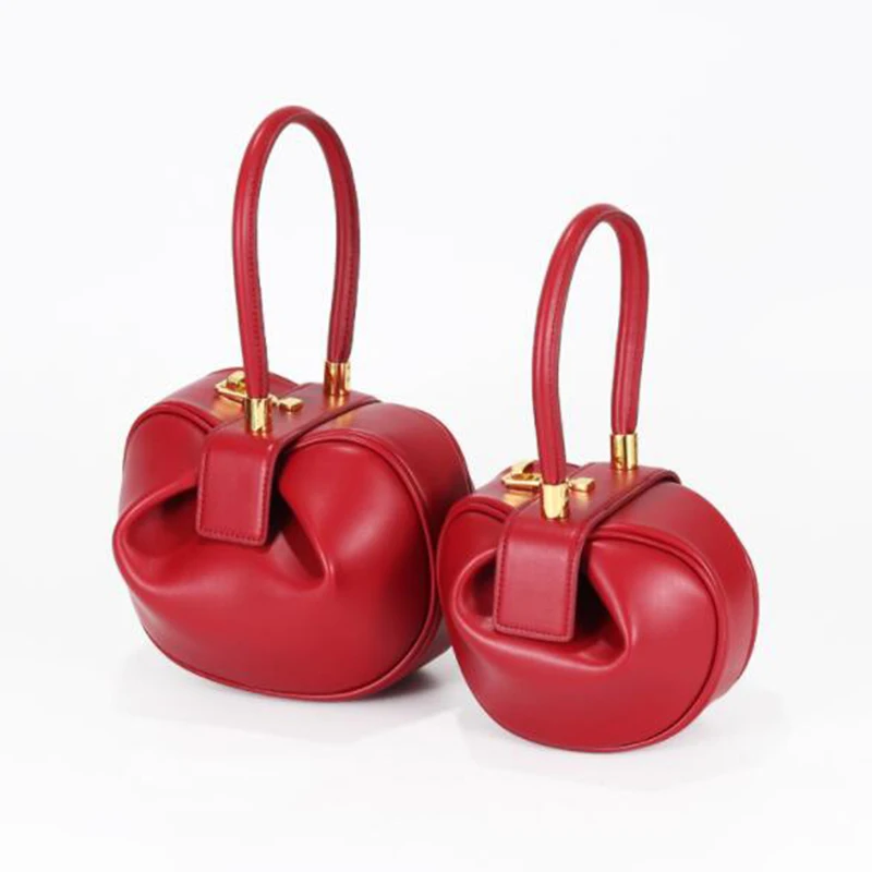 جديد جلد طبيعي المرأة دلو حقائب جولة حقائب السيدات الصلبة زلابية حقيبة أعلى-حقائب بيد خمر جرس شكل حمل