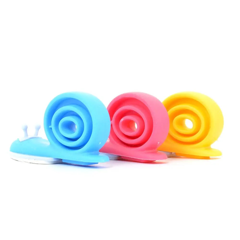 

Plastic Snail Shaped Baby Proofing Finger Pinch Guard Safety Door Stopper