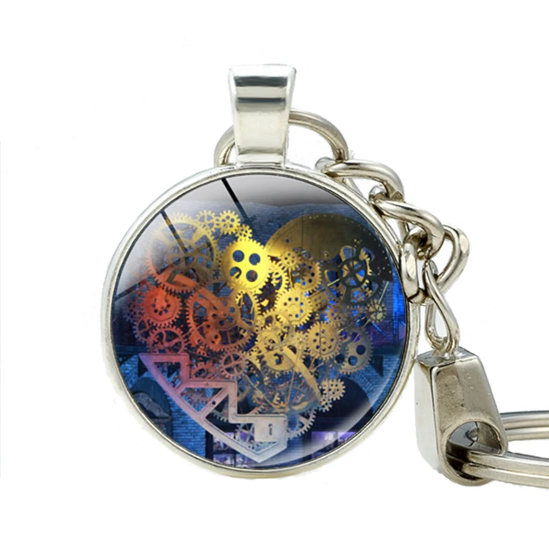 

The Boy with the Cuckoo-Clock Heart keychain The Mechanics of the Heart keychains Handmade Glass Photo Jewelry Key Holder
