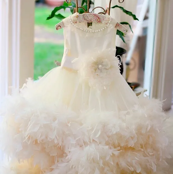 Best price at $143 Cheap Fancy Girls Pageant Flower Feather Ruffles Dresses Crew Neck Cream Ball Gown Kids Party Pageant Dresses for Girls Glitz 2017 New