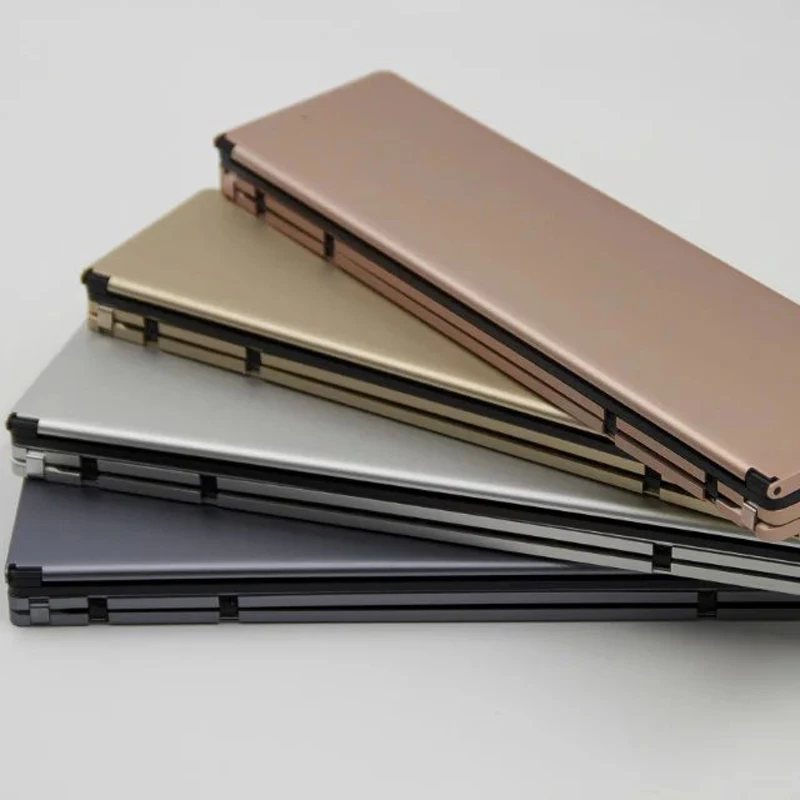 

Universal Mini Wireless Bluetooth 3.0 Folding Foldable Keyboard for iPhone iPad iOS Android Smartphone Tablet Bluetooth Keyboard