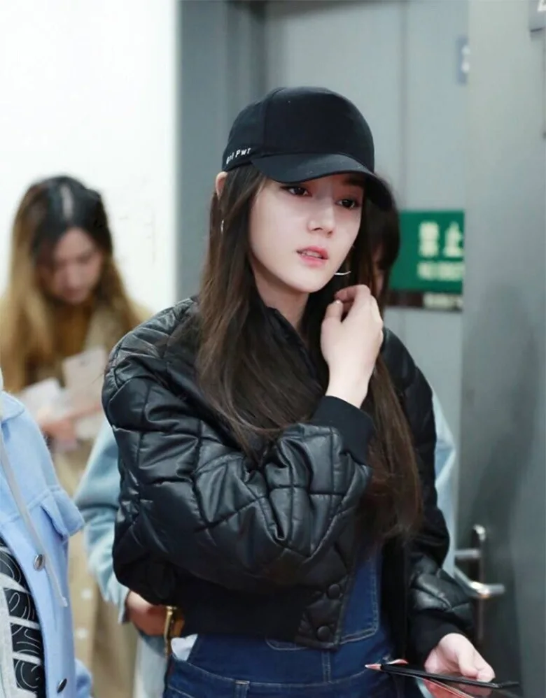 baseball cap with long hair