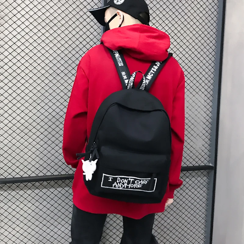2019 nueva Mochila de lona de moda las mujeres Mochila muñeca de colgante de las mujeres bolsa de hombro Harajuku Mochila mujeres Mochila