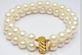 

2 layers ROUND 9-10 MM white PEARL BRACELET 14k 42%