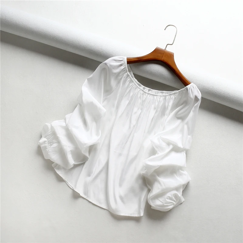 

2019 summer new Korean version of the loose thin word collar piled up sleeves silk people cotton pullover shirt women