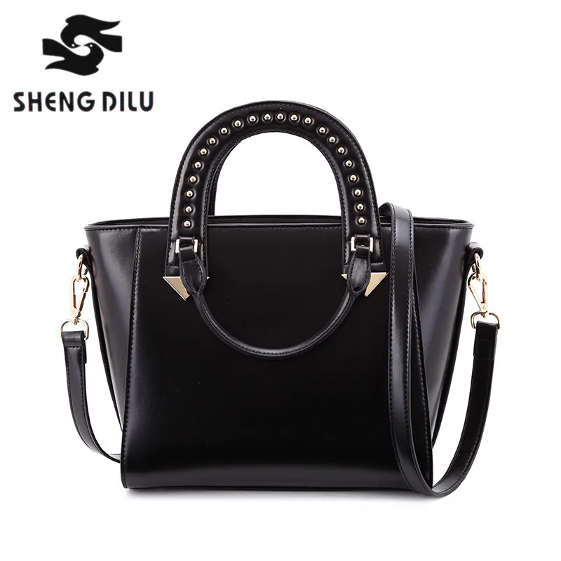 

Fashionable rivet small skin flap female bag designer handbag high quality Genuine leather leather lock bag Oblique cross packa.