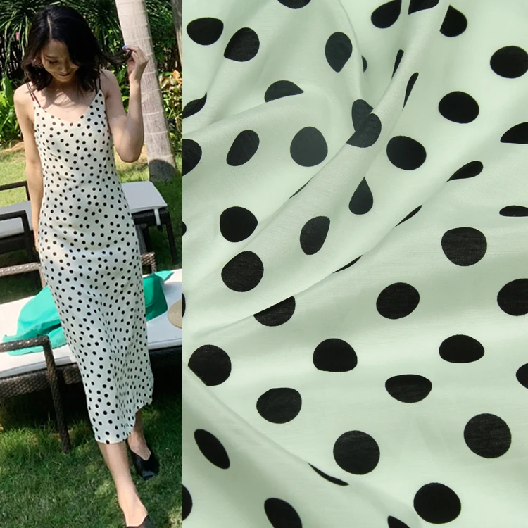 

Black polka dot print on white bottom silk and cotton blended fabric,SCT574