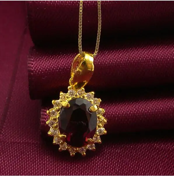 Yellow Gold Garnet Pendant|gold statue 