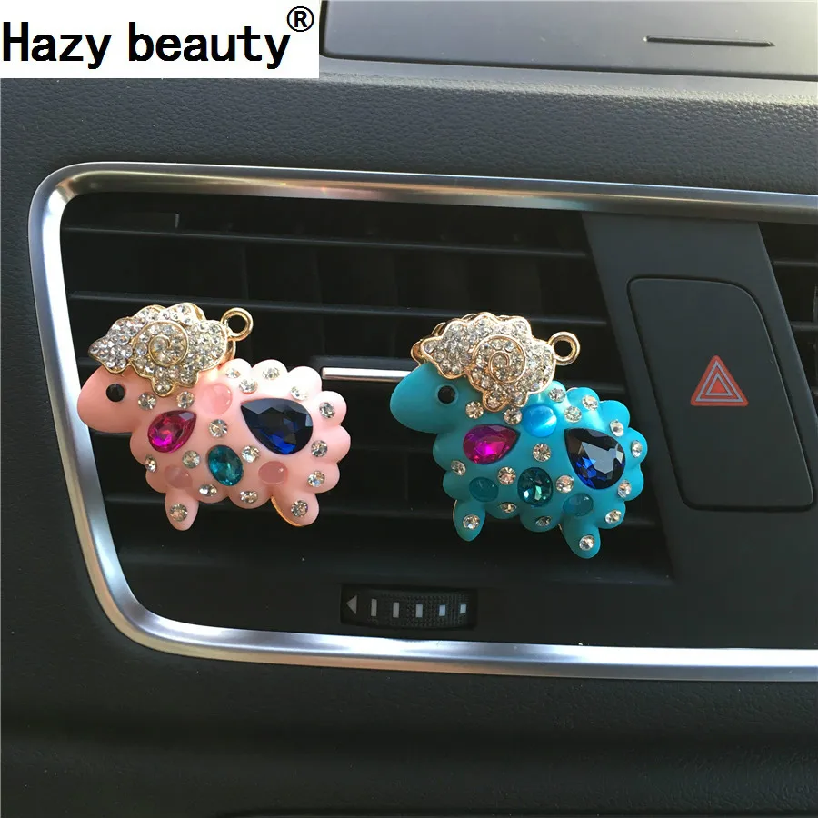 

Hazy beauty Small sheep car air-conditioning perfume clip diamond car accessories Car Air Freshener styling