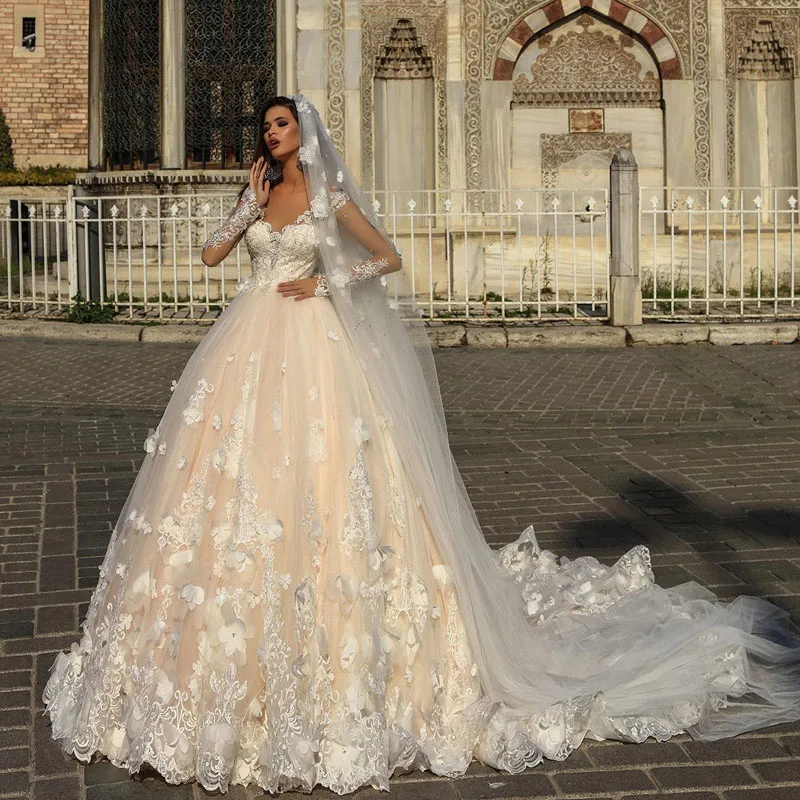 2018-gorgeous-designer-champagne-wedding-dresses-with-white-3d-flowers-illusion-sheer-long-sleeves-court-train-arabic-bridal-gowns