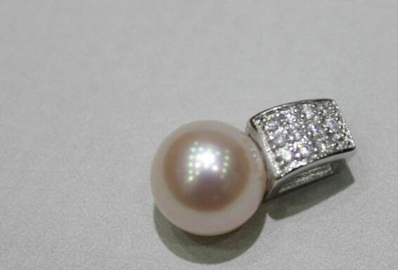 

Jewelr 004601 Natural pink fresh water pearl pendant 9.5mm