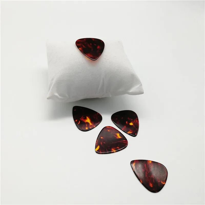 Free Shipping 100PCS Tortoise Shell Color Celluloid Guitar Picks Different Thickness Guitar Plectrum Free Shipping 100PCS Tortoise Shell Color Celluloid Guitar Picks Different Thickness Guitar Plectrum