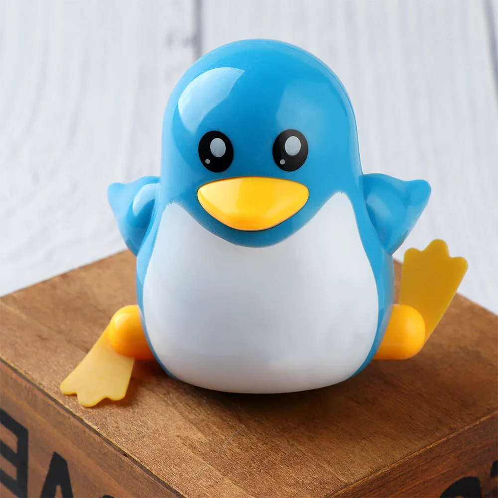 1Pcs Lovely Funny Children Kids Walking Penguins ABS Unisex Clockwork